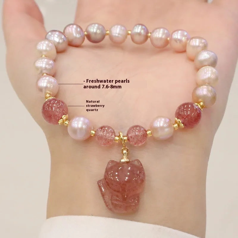 Women's natural freshwater pearl bracelet light pink colour with fox charm on wrist