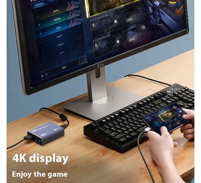 Black 4K gaming set-top box with MS2131 chip for audio recording and universal OS compatibility.
