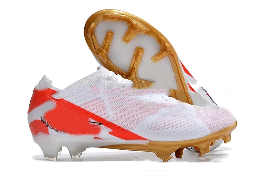 Men's low-top football shoes with knitted upper, rubber FG studs, and front lace-up closure.
