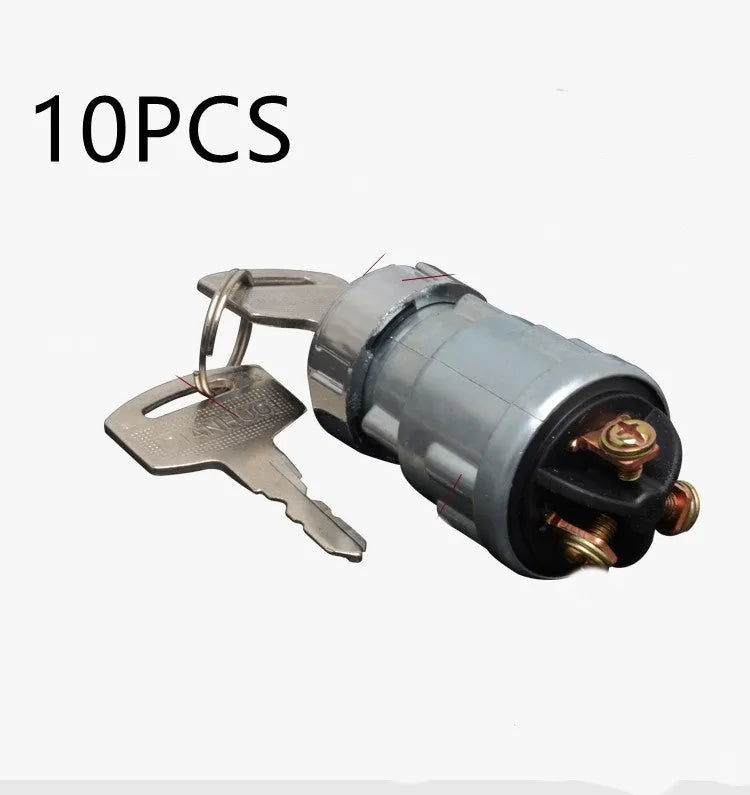 Copper ignition switch and key for trucks and forklifts on a white background.