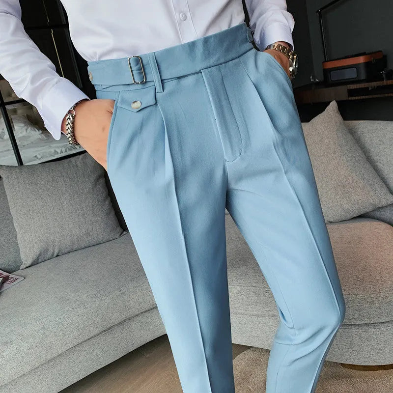 Straight-leg solid colour casual trousers in polyester on a size chart showing waist sizes 29 to 36.