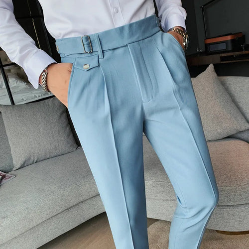 Straight-leg solid colour casual trousers in polyester on a size chart showing waist sizes 29 to 36.