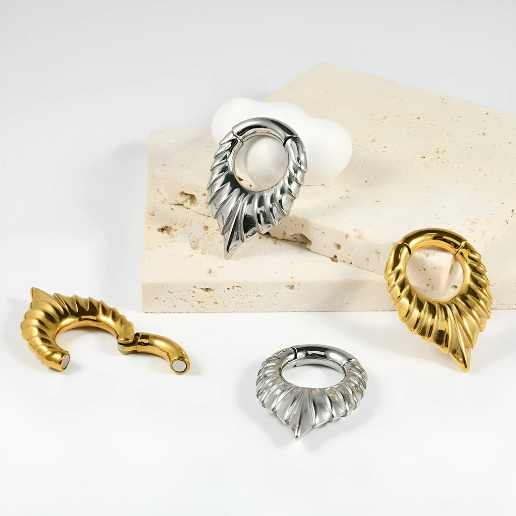 Drop-shaped stainless steel ear extender with totem pattern in round hanging egg shape