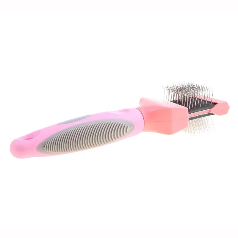 Double-sided pet brush showing stainless steel pins on one side and soft bristles on the other, with blue handle.