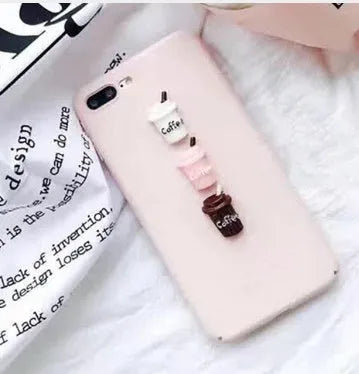 Soft pink TPU iPhone case with a raised white 3D cartoon cat design on the back.