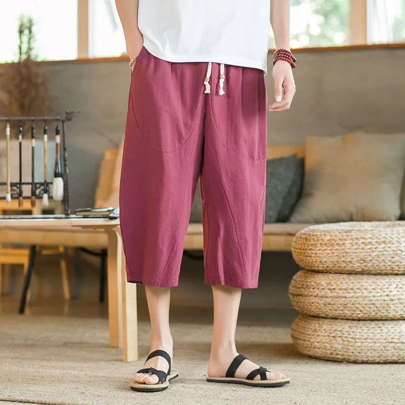 Straight cut linen summer shorts in khaki colour shown on hanger