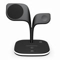 Black 3-in-1 wireless charging stand for phone, watch and headphones on a desk