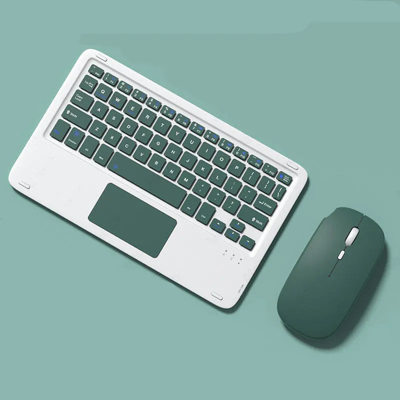 Pink wireless Bluetooth keyboard and mute mouse with USB charging cable on a desk