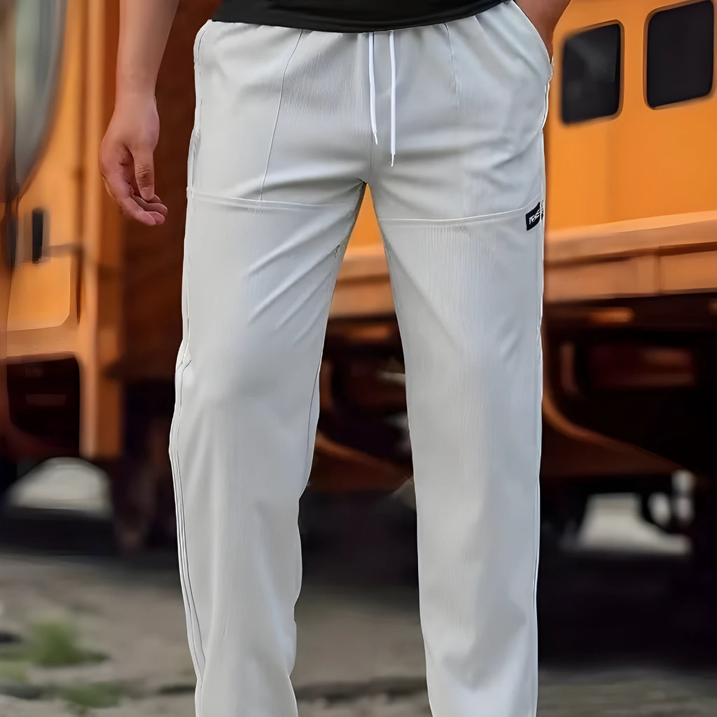 Men's polyester trousers for spring and autumn in light grey, available in sizes S to XXXL.