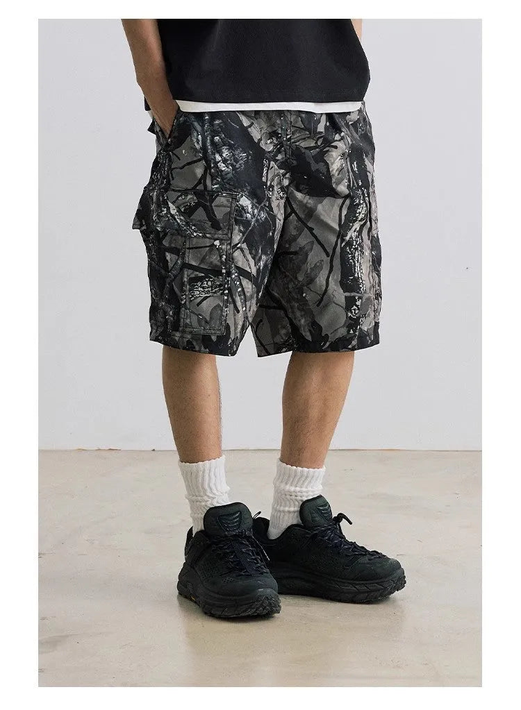 Loose fit denim shorts in army green with a straight leg and elastic waistband.