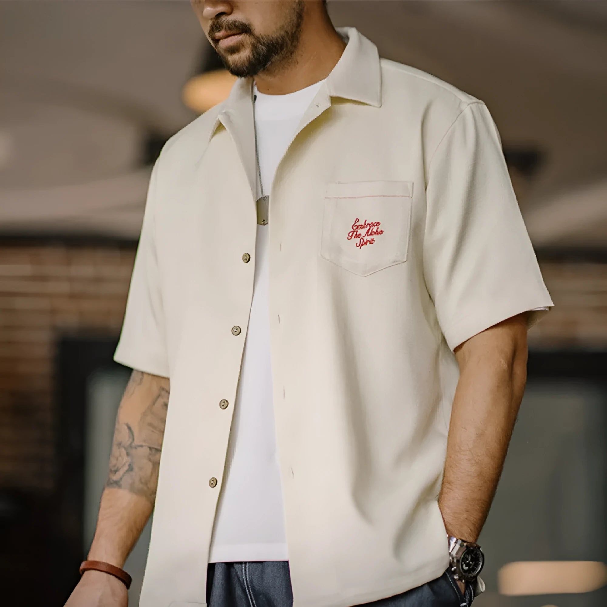 Light apricot men's Cuban collar shirt with a bamboo leaf and flower print