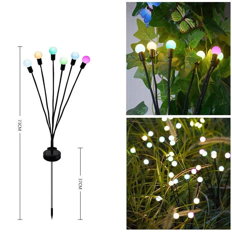 Solar-powered LED ground spike garden light with multiple heads and stainless steel soil plug.