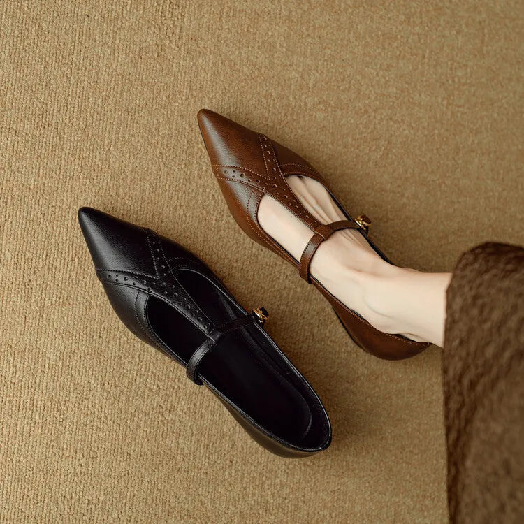 Brown women's low-cut cowhide leather flat shoes with round toe and soft sole on a white background.