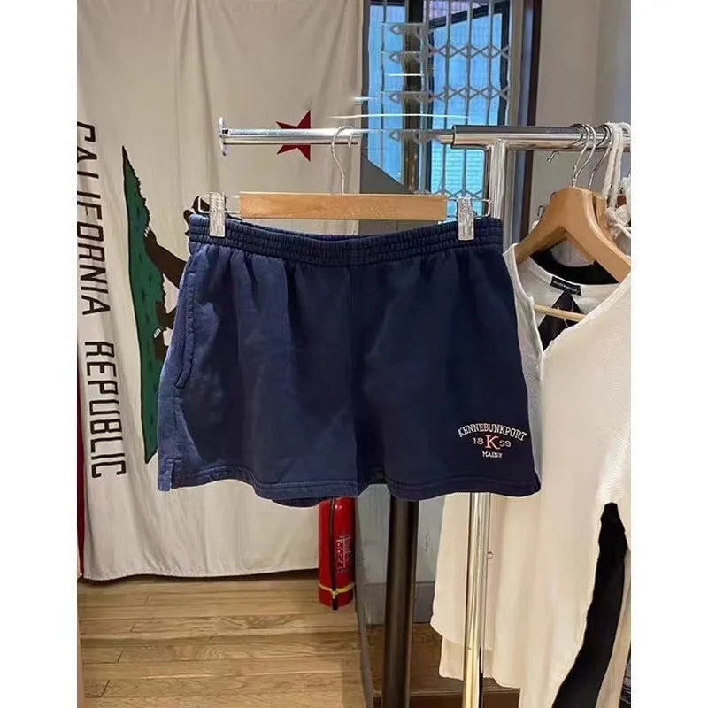 Women's dark blue cotton hot pants shorts with white flag embroidery, sporty athletic style
