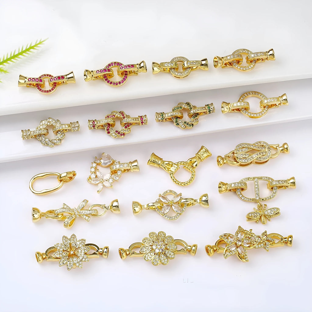 Small gold-coloured jewellery clasp buckle for necklace repair with electroplated finish