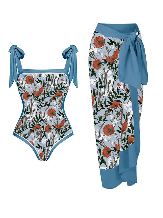 Women's printed floral two-piece swimsuit with a matching chiffon hip skirt.