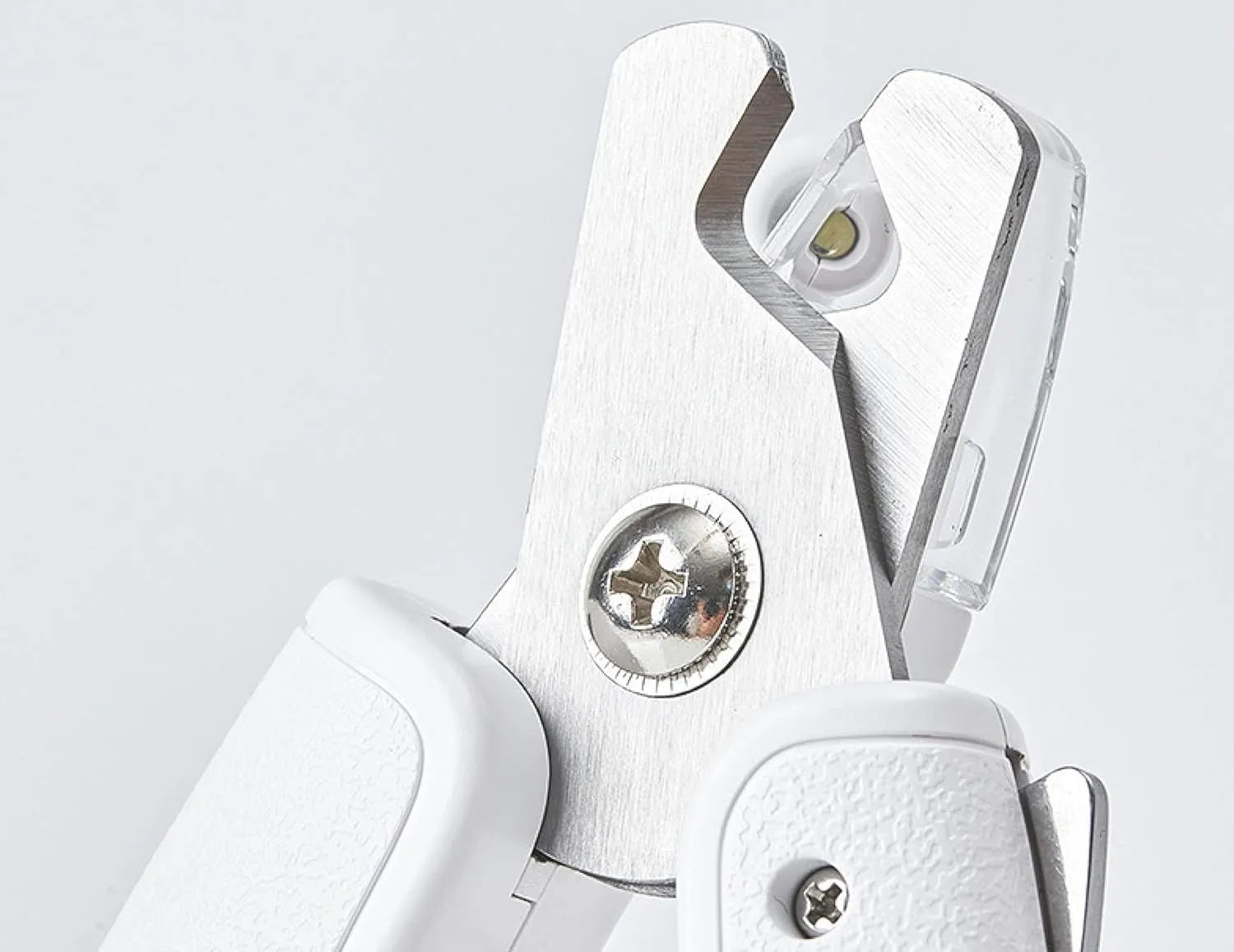 White pet nail clippers with LED light, transparent anti-splash baffle, and triangular steel blades for cats and dogs