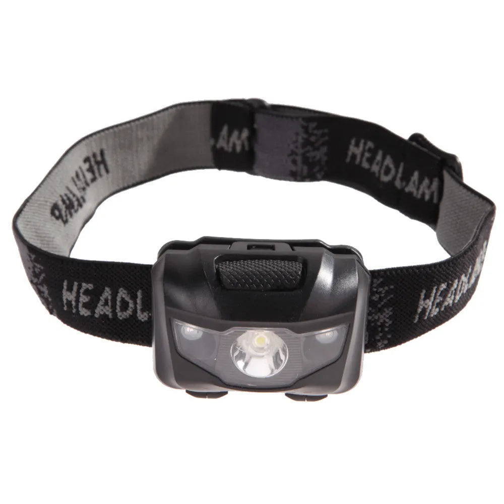 Black waterproof head torch with white and red LEDs mounted on adjustable headband for outdoor use.