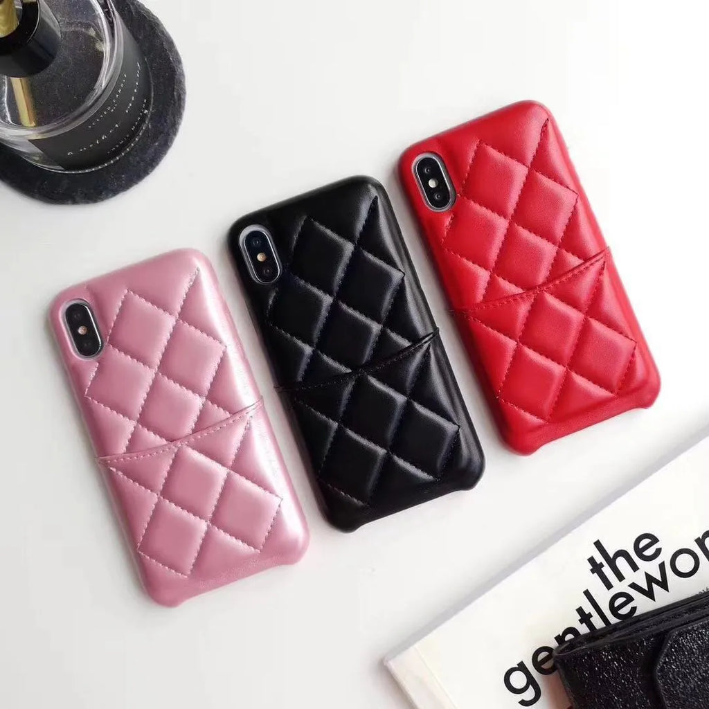 Genuine leather phone case for Apple iPhone in black, pink and red colour options.