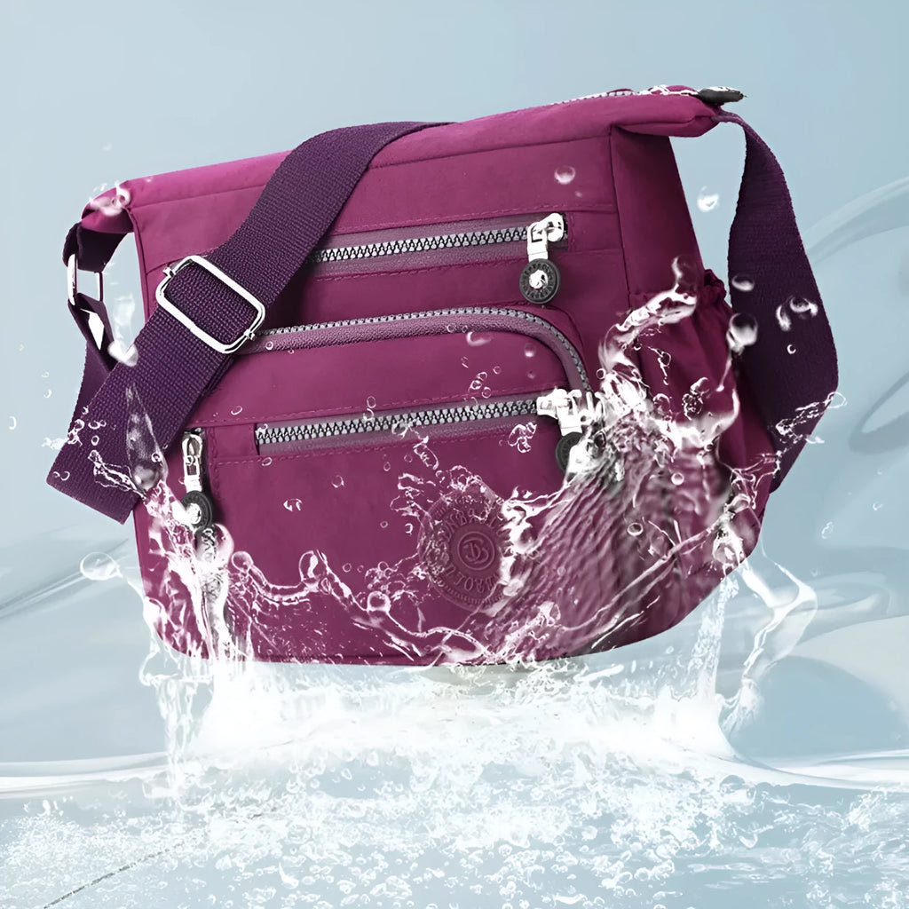 Soft nylon messenger bag with single shoulder strap in square vertical design showing grey colour option