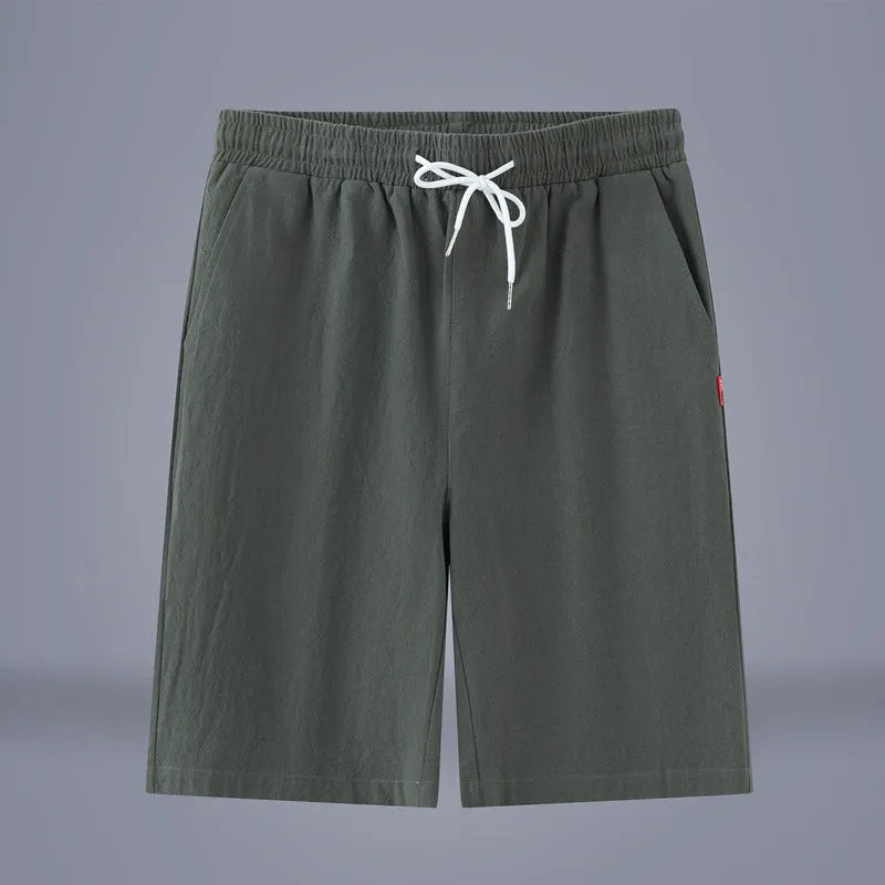 Cotton-linen blend cropped pants in a solid colour with a drawstring waist, shown in a mid-length cut.
