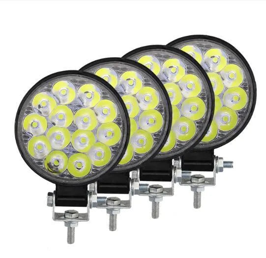 Mini round aluminium LED work light with white light, 42W power and IP67 waterproof rating.