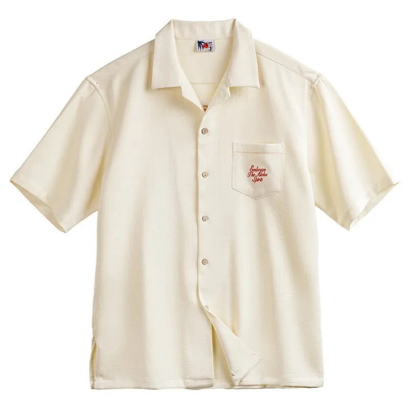 Light apricot men's Cuban collar shirt with a bamboo leaf and flower print