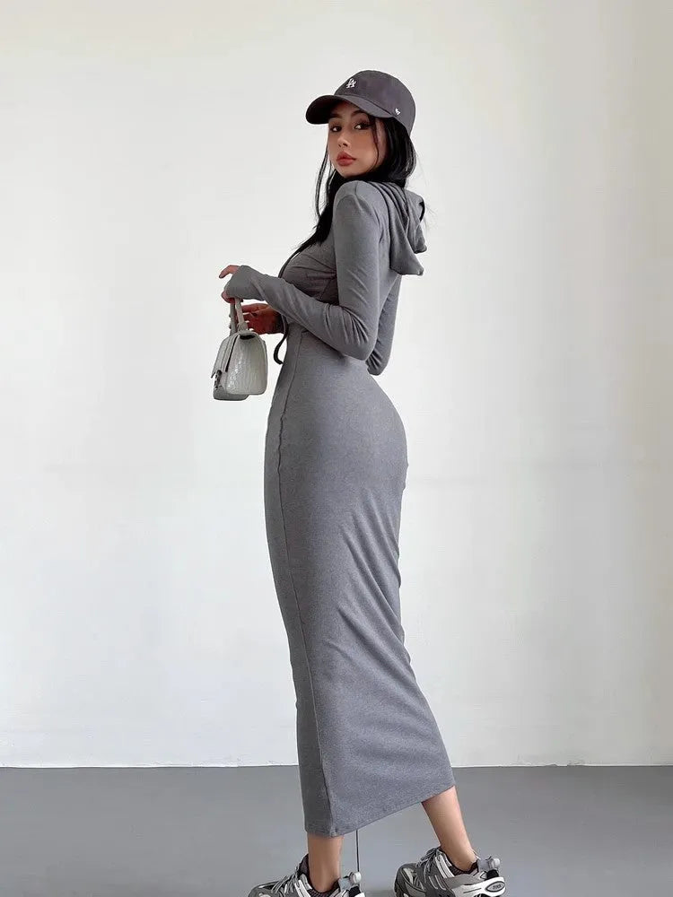 Women's long sleeve hooded sheath dress in grey with over-the-knee length and high waist.