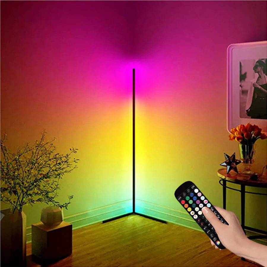 Black smart RGB floor lamp with remote control on household floor