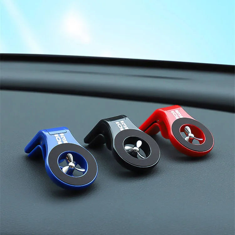 Magnetic car air vent phone holder with adjustable paddle in black colour showing smartphone attached