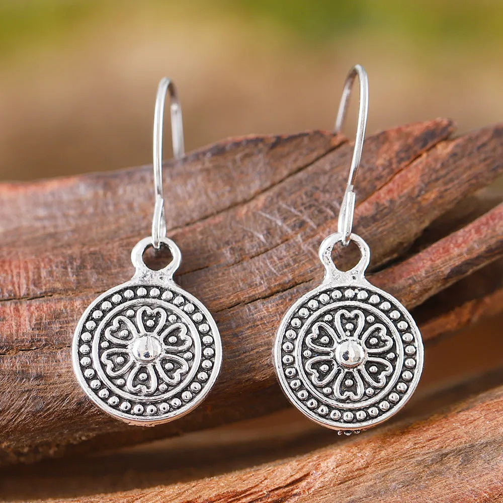 Women's bohemian retro earrings with round distressed ethnic print in zinc alloy