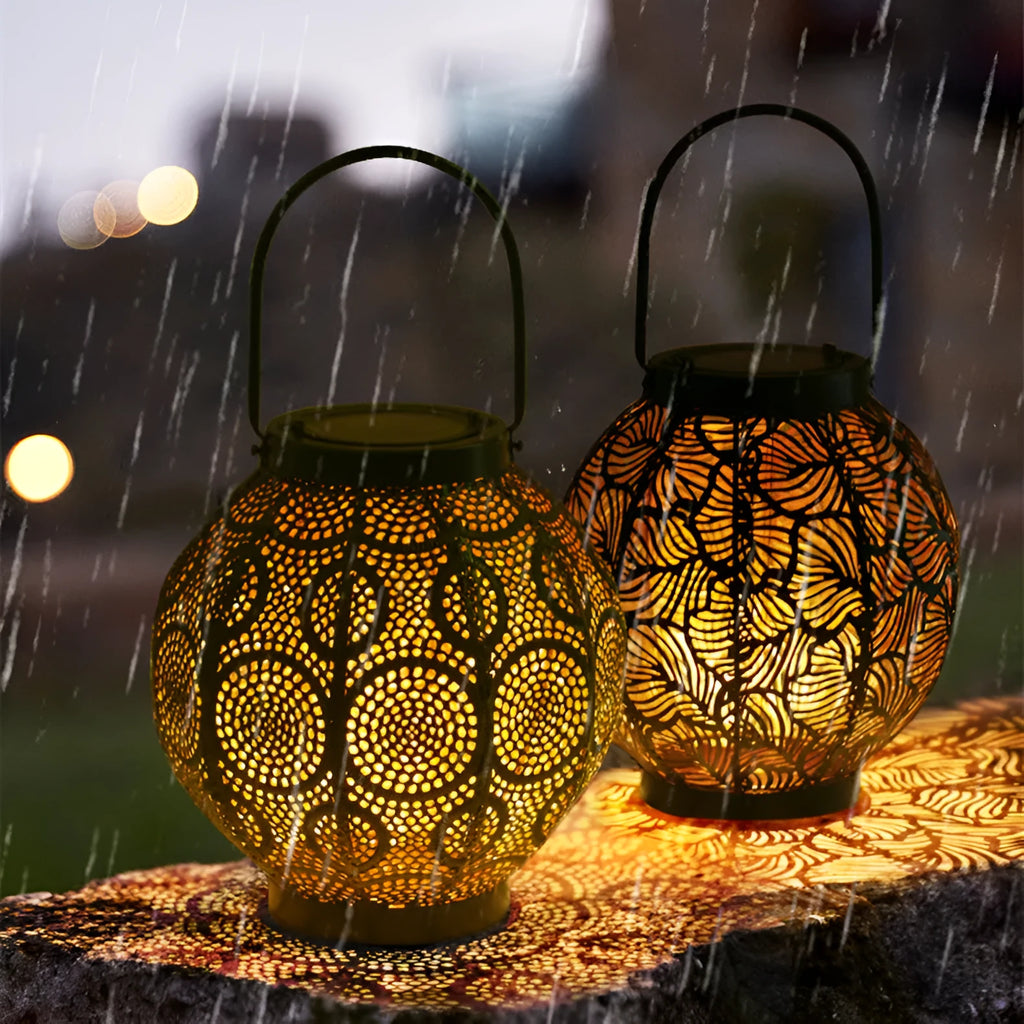 Solar-powered iron courtyard lamp with decorative hollow design and warm white LED lighting