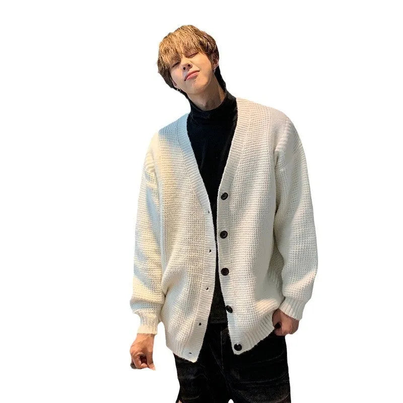 Men's loose fit V-neck knitted cardigan sweater in a solid colour on a hanger.