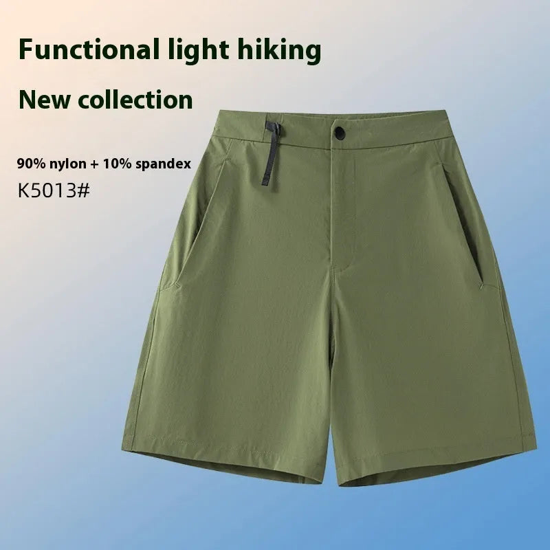 Men's khaki quick-drying sports shorts with 3D elastic cutting on a grey background.
