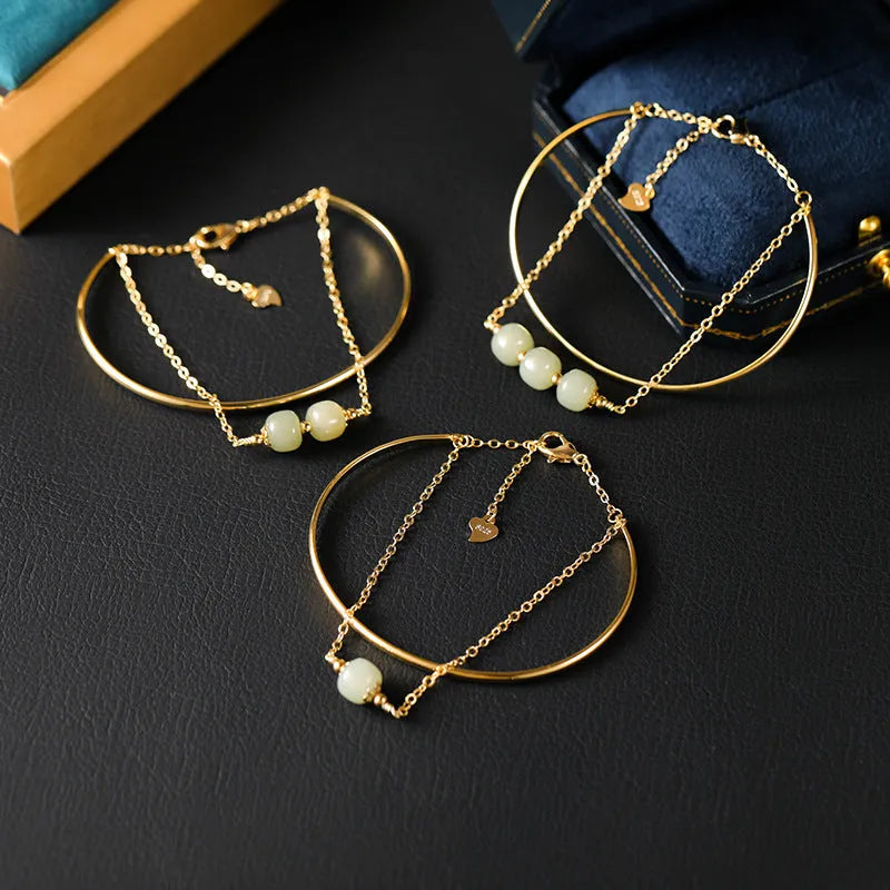 Women's jade bracelet with gold inlay detailing showing single, double and three bead versions