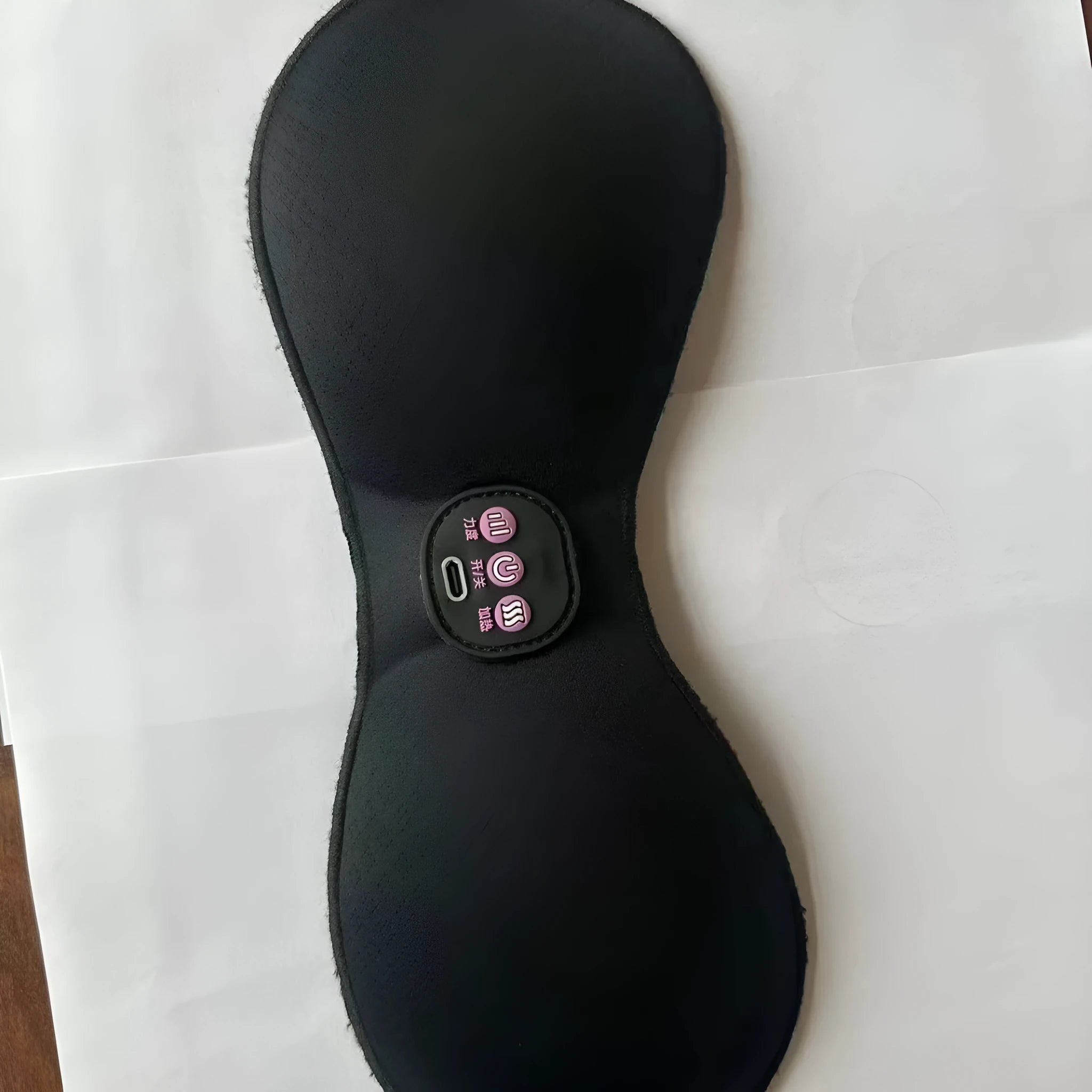 Black electric massage chest stickers with a 3-keys English control panel for vibration therapy.