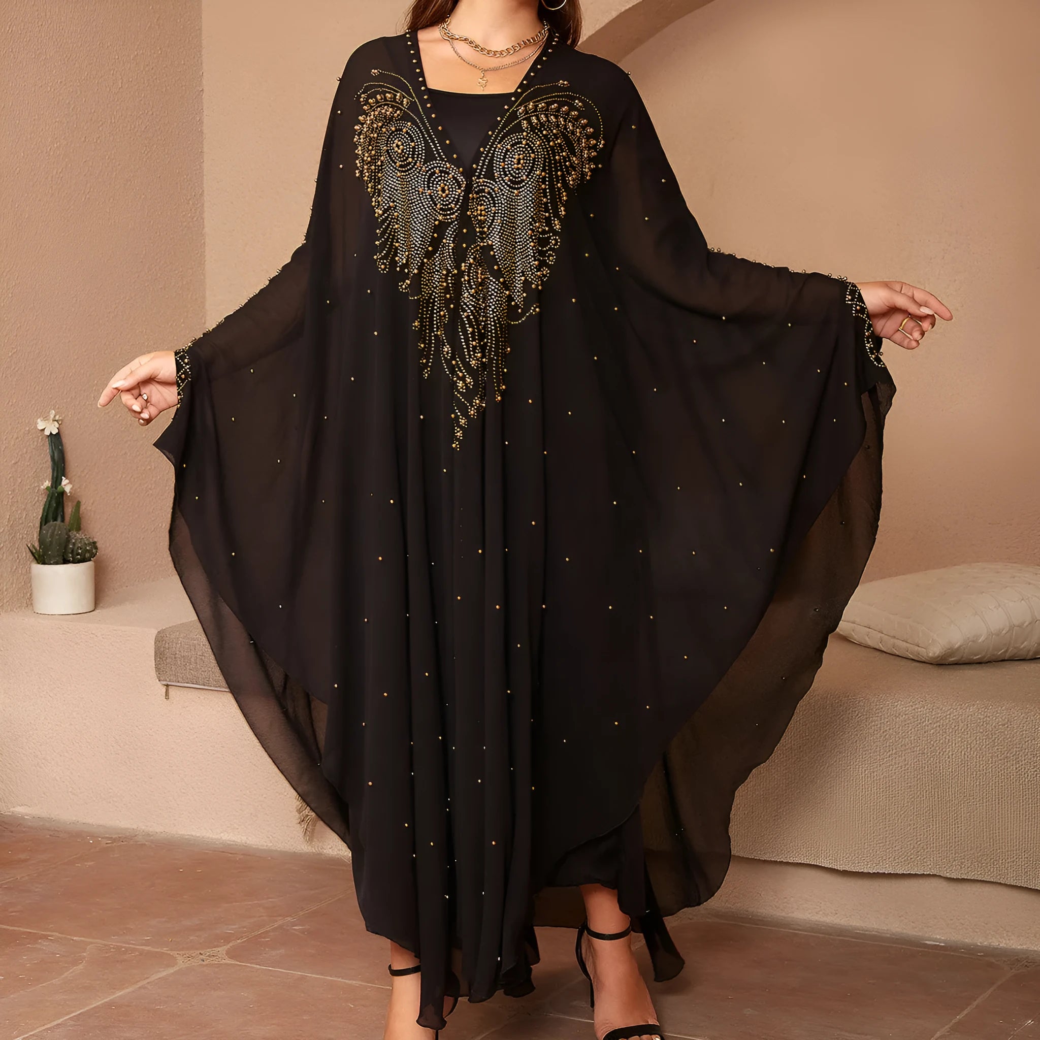Purple chiffon shawl with rhinestone beading along edge showing draped styling