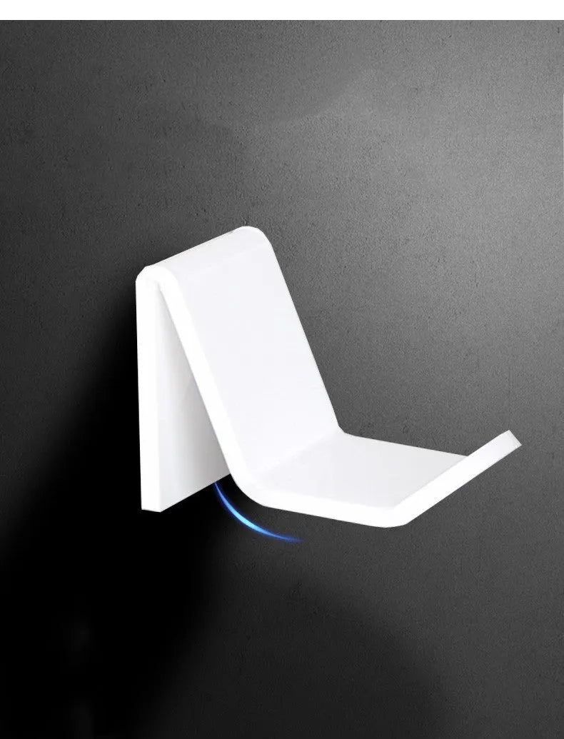 Universal game controller wall bracket in choice of black, white or transparent colour