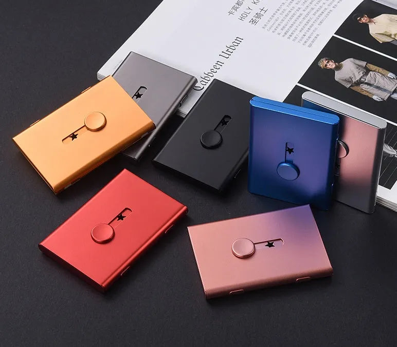 Hand push aluminium alloy RFID blocking business card case in black, 93x65x12mm, holding 6 cards