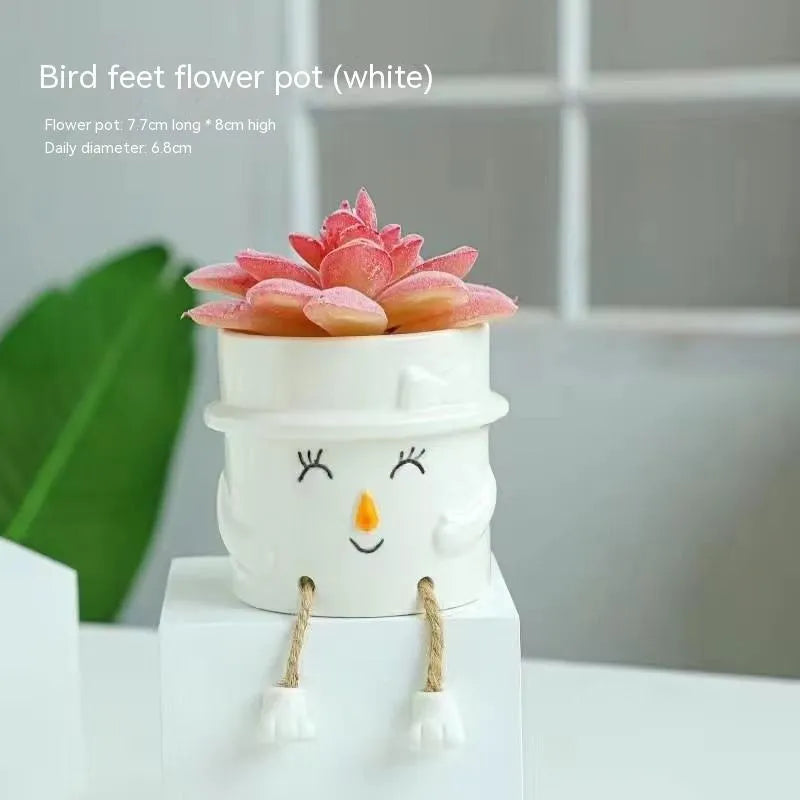 Ceramic hanging foot flowerpot for succulent plants on desktop