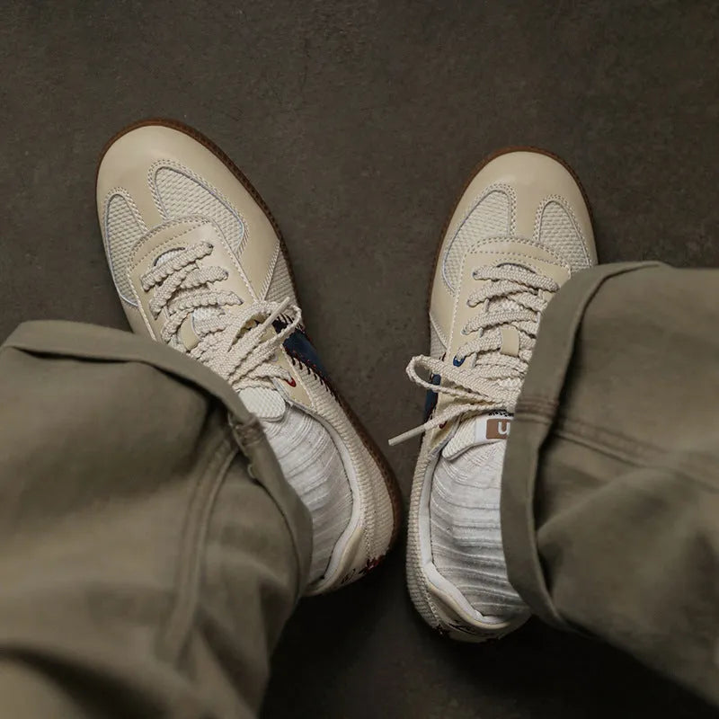 White men's casual exercise sneakers with mesh upper and low flat heel