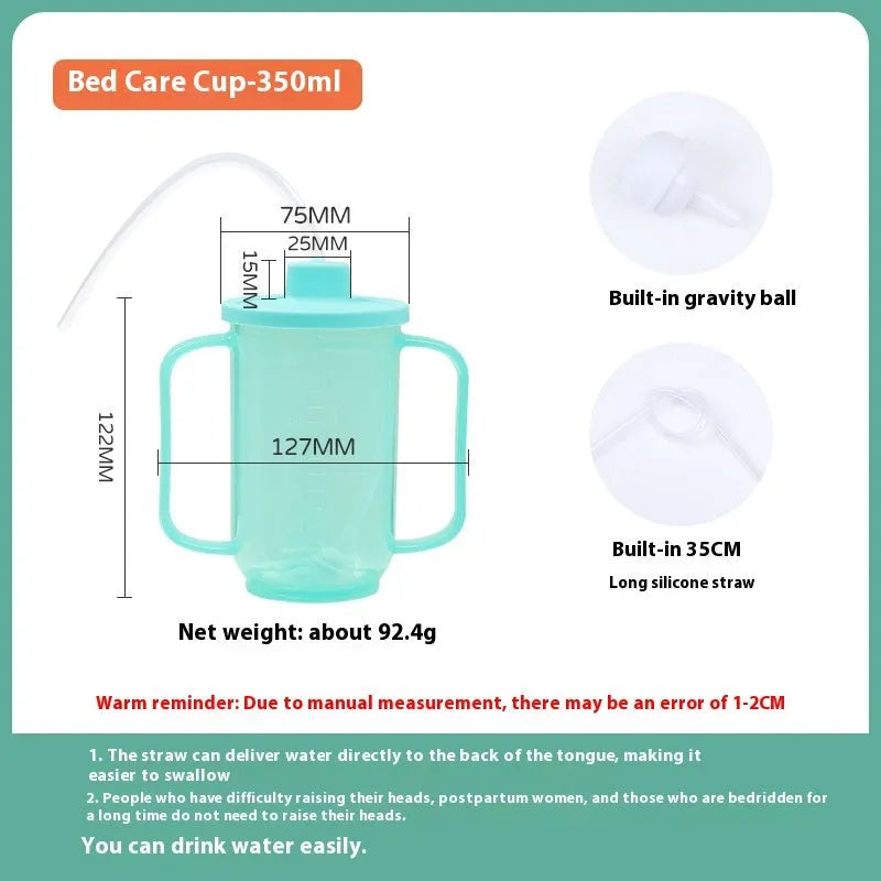 Adult bedside drinking cup with angled choke-proof mouth, handle, and lid, shown in care setting.