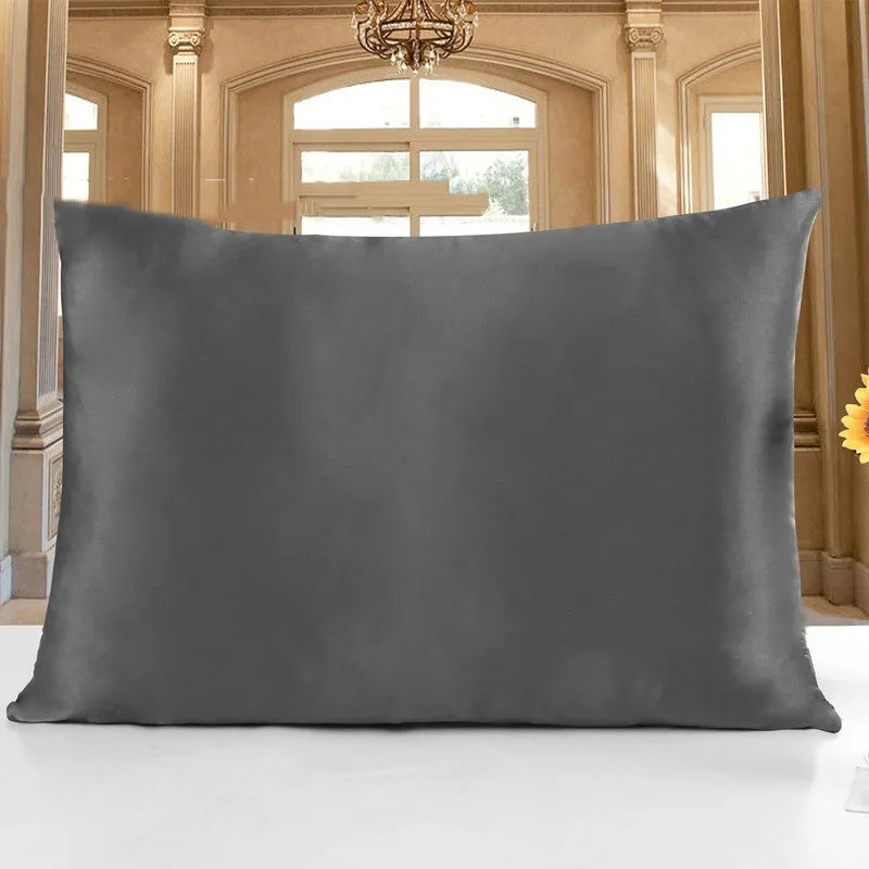 Double-sided silk pillowcase showing reversible design in apricot colour with three size options displayed