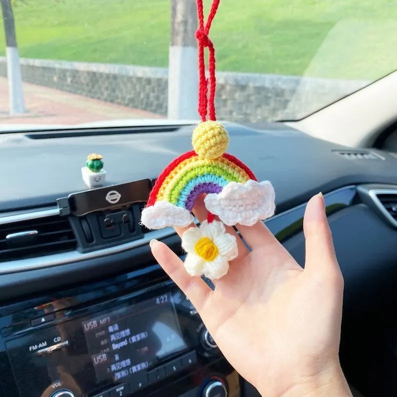 Handmade crocheted avocado car pendant with rainbow flower design in wool material