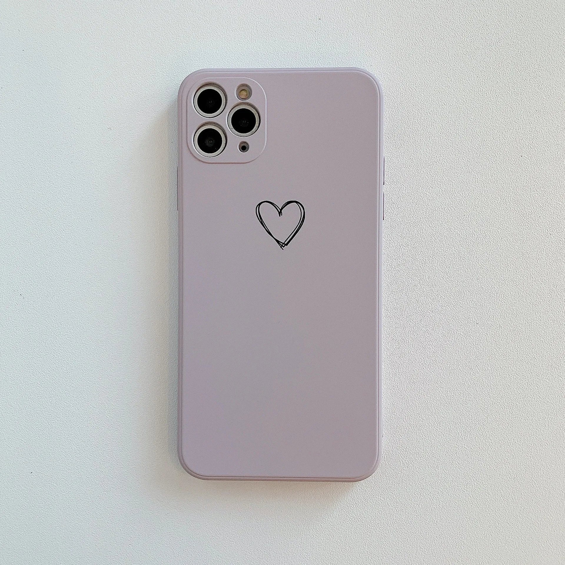 Silicone phone case for Apple iPhones in multiple solid colours including black, white, and pastel options