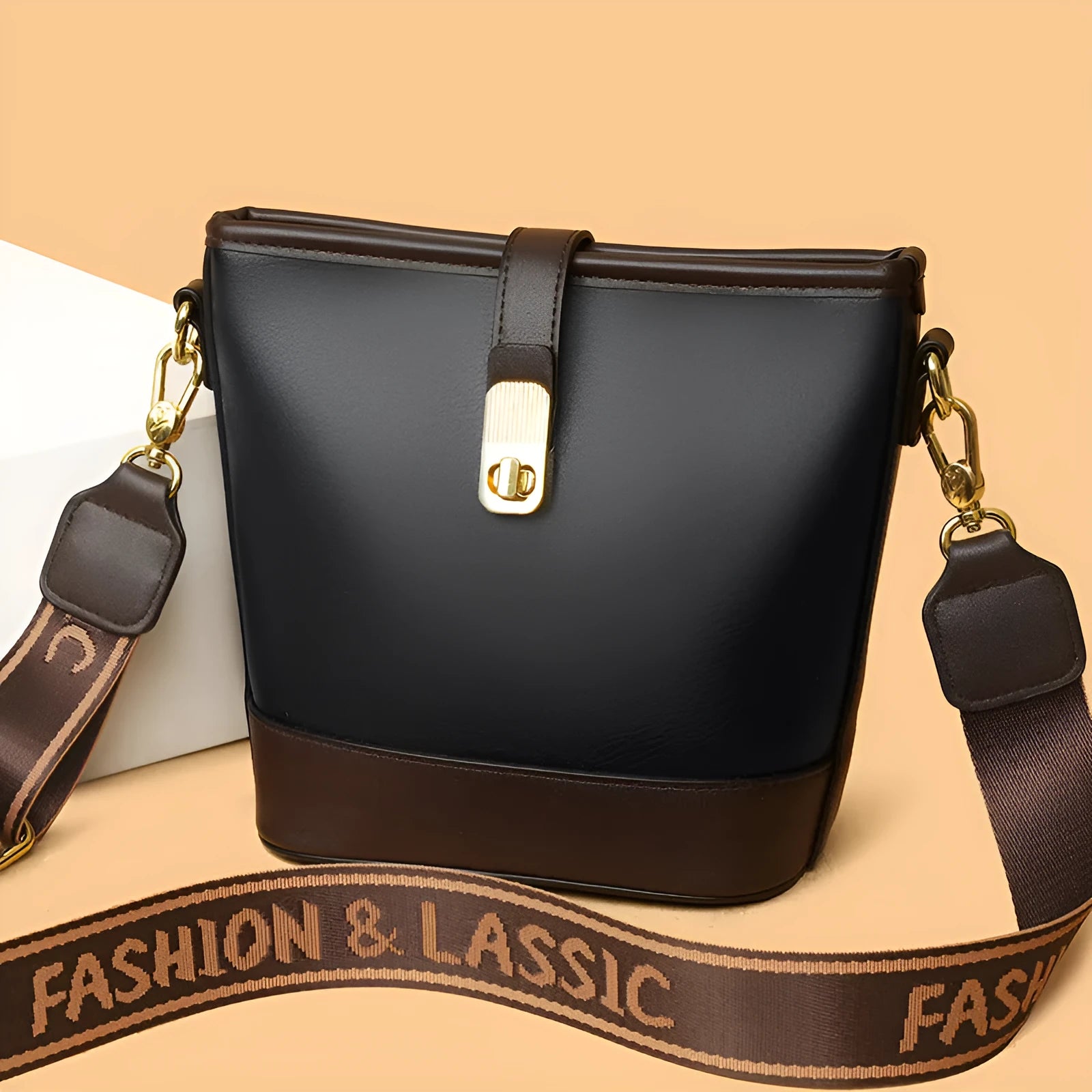 Korean style soft PU bucket messenger bag with adjustable straps in black showing internal zipper compartments