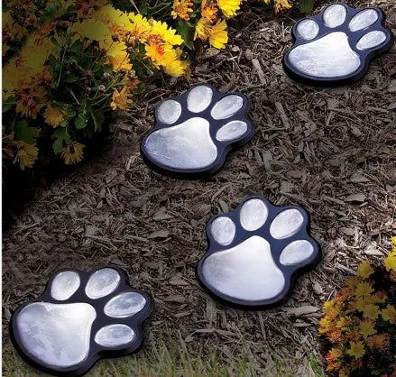 Black bear paw-shaped solar garden lights with solar panel pole for outdoor pathway illumination