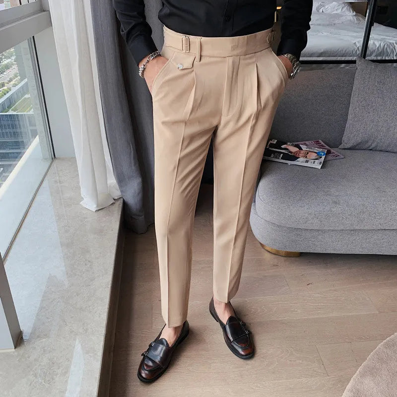 Straight-leg solid colour casual trousers in polyester on a size chart showing waist sizes 29 to 36.