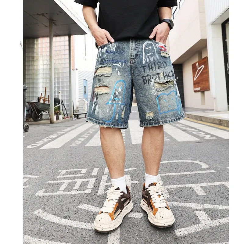 Blue ripped men's denim shorts with straight-leg cut and zipper fly closure