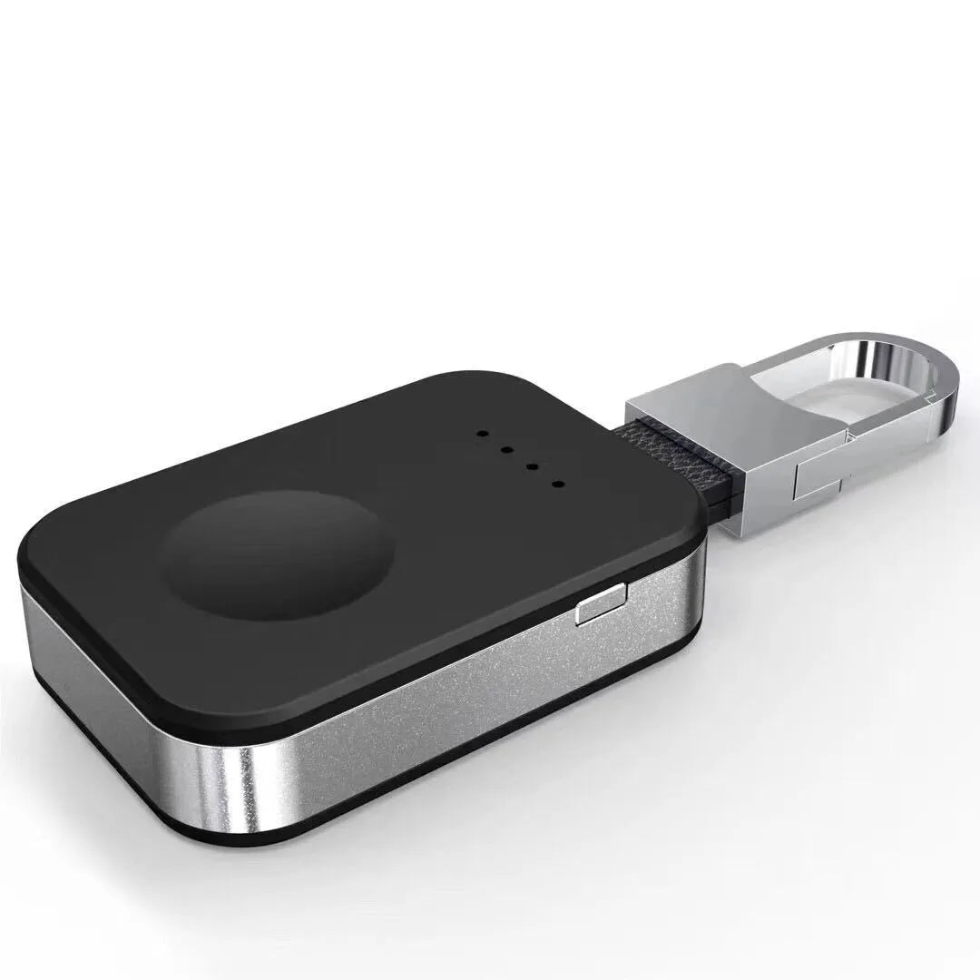 Black Apple Watch keychain power bank showing wireless charging surface and compact size